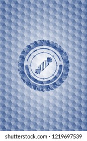 candy icon inside blue emblem or badge with abstract geometric polygonal pattern background.