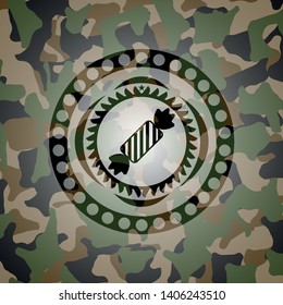 candy icon inside camouflage texture