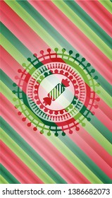 candy icon inside christmas style badge..
