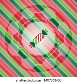 candy icon inside christmas style emblem.