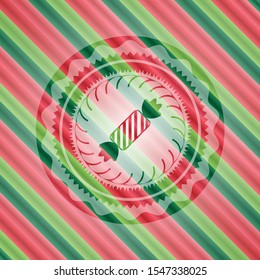 candy icon inside christmas style badge..