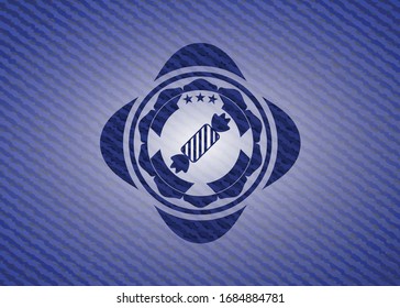 candy icon inside emblem with jean texture