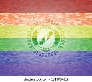 candy icon inside emblem on mosaic background with the colors of the LGBT flag