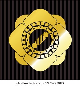 candy icon inside gold badge or emblem