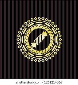 candy icon inside gold emblem or badge