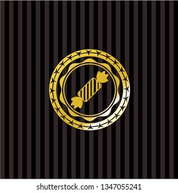candy icon inside golden badge