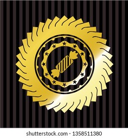 candy icon inside golden emblem or badge