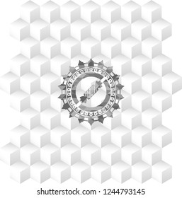 candy icon inside grey badge with geometric cube white background