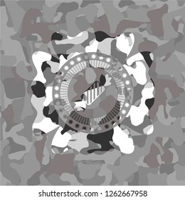 candy icon inside grey camo emblem