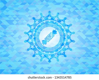 candy icon inside light blue mosaic emblem