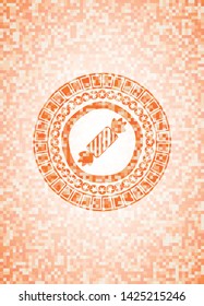 candy icon inside orange mosaic emblem