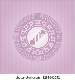 candy icon inside realistic pink emblem