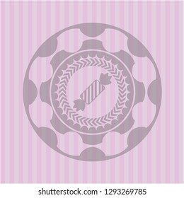candy icon inside realistic pink emblem