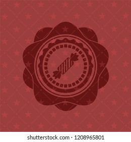 candy icon inside realistic red emblem