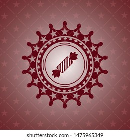 candy icon inside realistic red emblem
