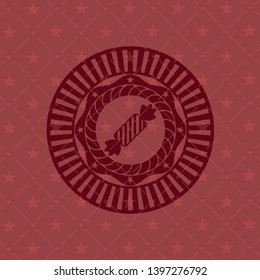 candy icon inside red icon or emblem