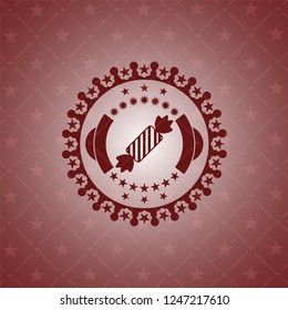 candy icon inside retro red emblem