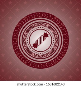 candy icon inside retro style red emblem