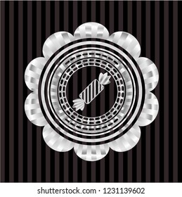 candy icon inside silver badge