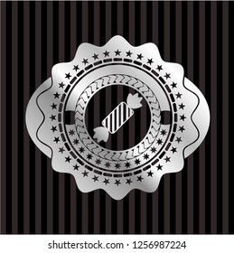 candy icon inside silver badge