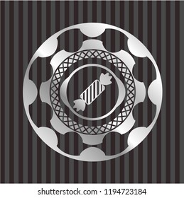 candy icon inside silvery shiny badge