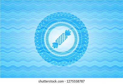 candy icon inside sky blue water style badge.