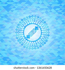 candy icon inside sky blue emblem with mosaic ecological style background