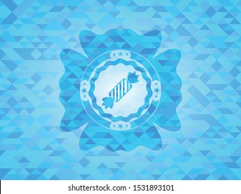 candy icon inside sky blue mosaic emblem