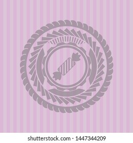candy icon inside vintage pink emblem