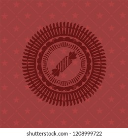 candy icon inside vintage red emblem