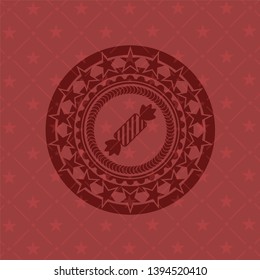 candy icon inside vintage red emblem