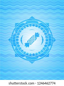 candy icon inside water wave concept badge background.