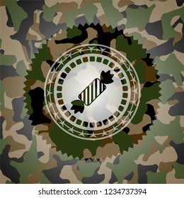 candy icon on camouflage pattern