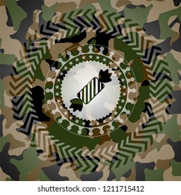 candy icon on camouflage texture