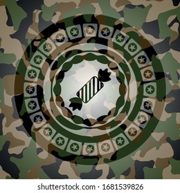 candy icon on camouflaged pattern