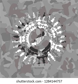 candy icon on grey camouflaged texture