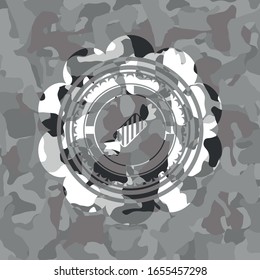 candy icon on grey camouflaged pattern