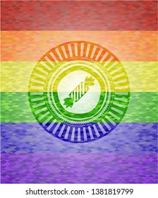 candy icon on mosaic background with the colors of the LGBT flag