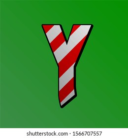 Candy letter on a green background