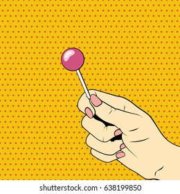 Candy lollipop in a female hand. Vector