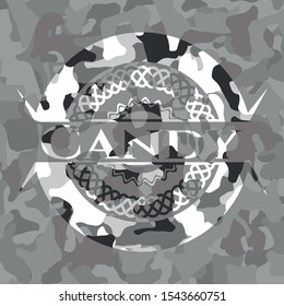 Candy on grey camouflage texture
