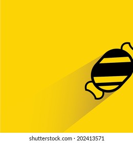 candy on yellow background, shadow and flat theme