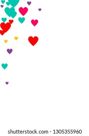 Candy of red, yellow, blue and purple hearts on a white background. Flying confetti from hearts. Valentine's day card.