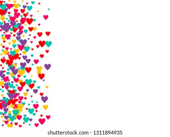 Candy of red, yellow, blue and purple hearts on a white background. Flying confetti from hearts. Valentine's day card.