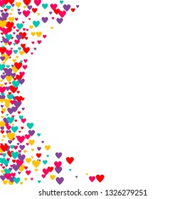 Candy of red, yellow, blue and purple hearts on a white background. Flying confetti from hearts. Valentine's day card.