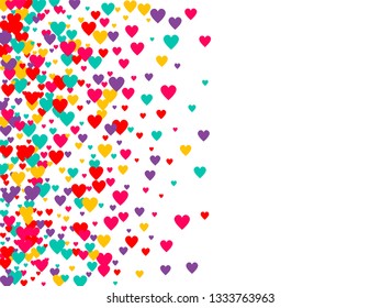 Candy of red, yellow, blue and purple hearts on a white background. Flying confetti from hearts. Valentine's day card.