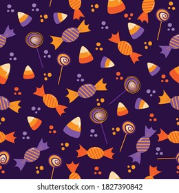 Candy Seamless pattern for Halloween - Candy corn, lollipop, and sweets on purple background. Good for wrapping paper, textile print, wall paper, poster, card or decoration.