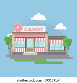 Candy shop building. Isolated urban building with sign and storefront. City landscape with clouds and trees.