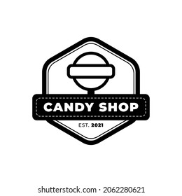 Vector del logo de Candy Shop con símbolo de caramelo y marco hexagonal