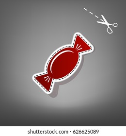 Candy sign illustration. Vector. Red icon with for applique from paper with shadow on gray background with scissors.